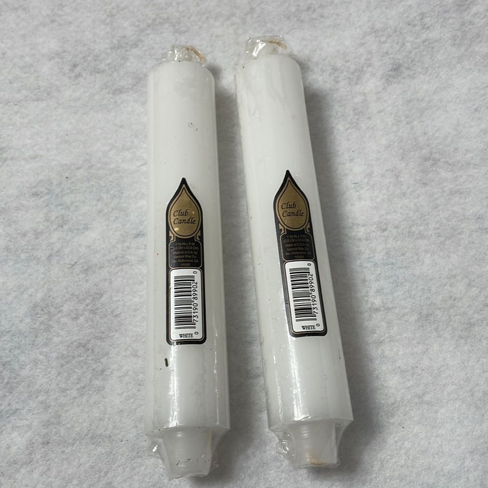 Candles. 1 1/2” diameter and 9” tall. X2. New in wrappers.